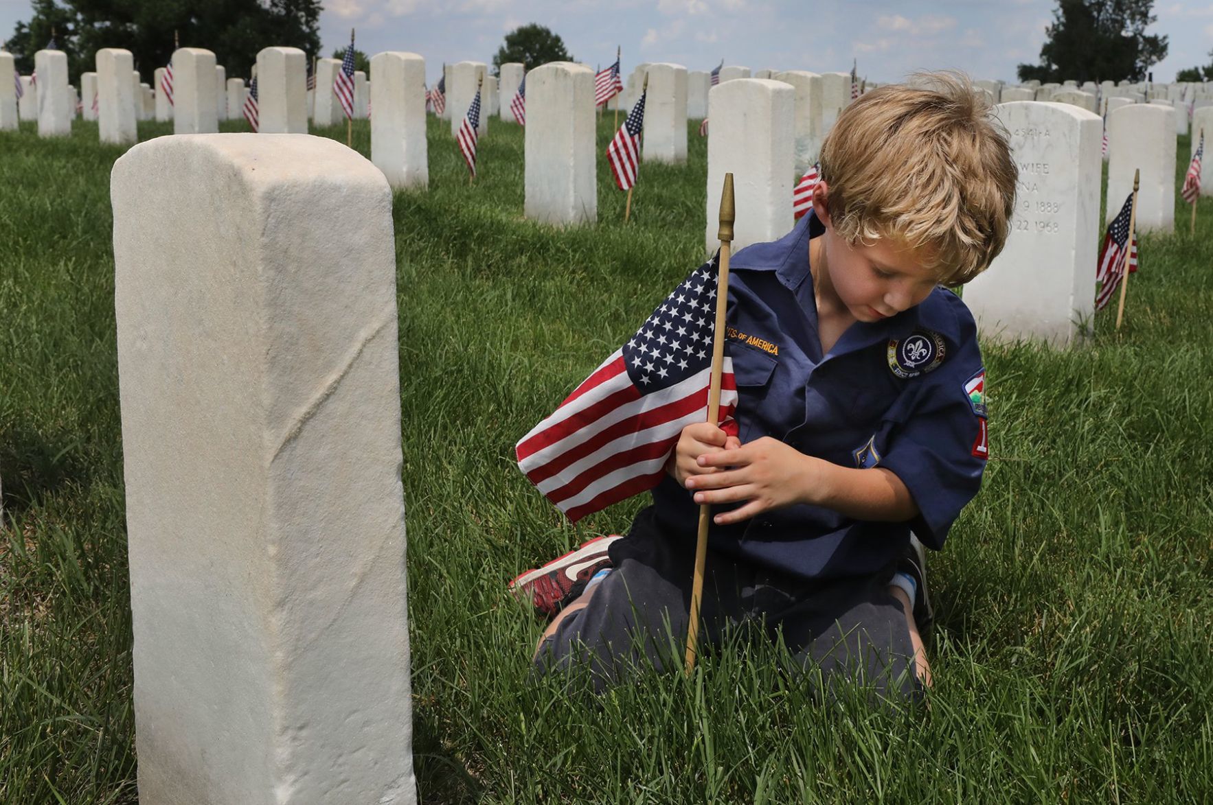 Scouts place flags in Jefferson Barracks for Memorial Day